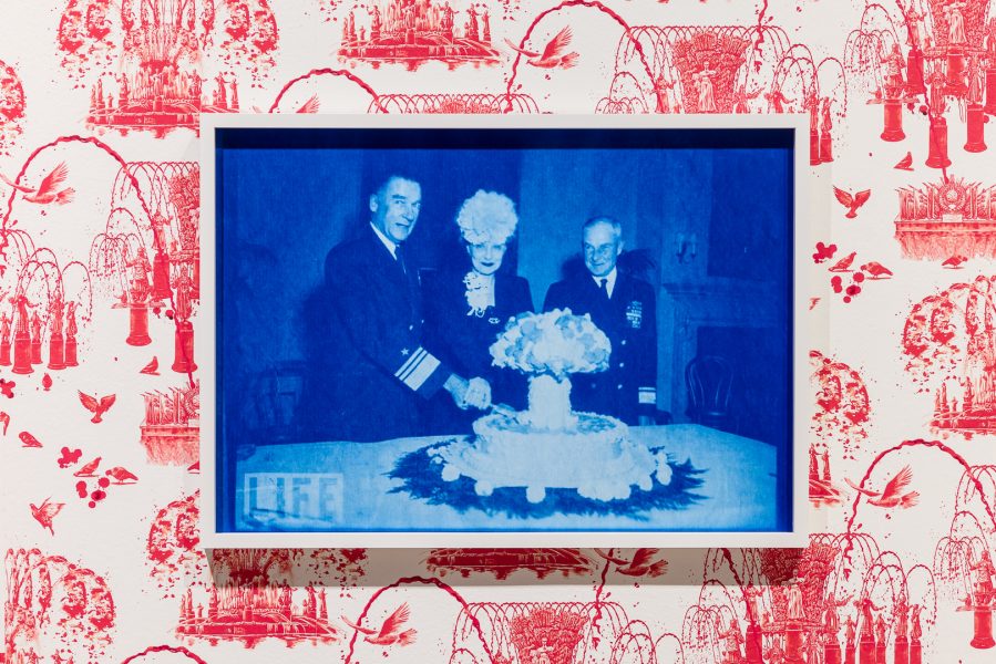 Left to right: Saule Dyussenbina, Achievements of National Economy, Fountain of Friendship of Peoples of the USSR (Moscow, Russia) (wallpaper), 2023. Courtesy the artist © Saule Dyussenbina. Breda Lynch, Cake Bomb, 2016–21. Presentation at the 24th Biennale of Sydney was made possible with assistance from Culture Ireland. Courtesy the artist © IMMA Collection: Purchase, 2021. Exhibition Copy. Installation view, 24th Biennale of Sydney, Ten Thousand Suns, 2024, Art Gallery of New South Wales. Photograph: Document Photography.
