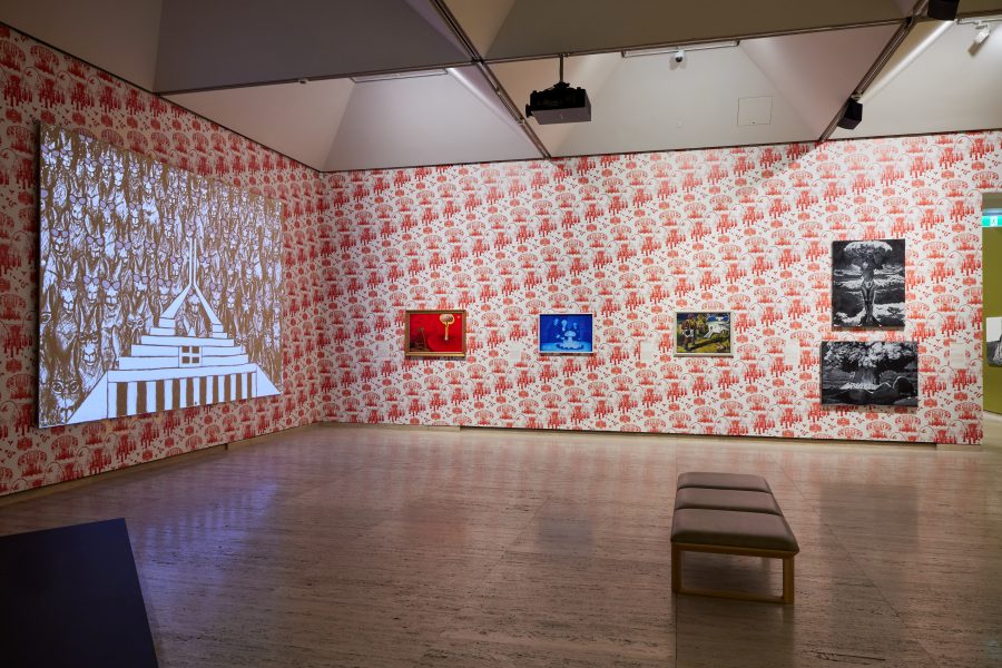 Left to right: Saule Dyussenbina, Achievements of National Economy, Fountain of Friendship of Peoples of the USSR (Moscow, Russia), 2023. Courtesy the artist © Saule Dyussenbina. Gordon Hookey, Terraist, 2014; Fuck off French Fried Frog Face Frick, 1995. Courtesy the artist and Milani Gallery © Gordon Hookey. Breda Lynch, Cake Bomb, 2016–21. Presentation at the 24th Biennale of Sydney was made possible with assistance from Culture Ireland. Courtesy the artist © IMMA Collection: Purchase, 2021. Exhibition Copy. Weaver Hawkins, Atomic Power, 1947. Purchased 1976, Art Gallery of New South Wales. Courtesy the artist © Estate of HF Weaver Hawkins. Eisa Jocson, Bikini, 2009–23; All is vain, 2009–23. Courtesy the artist © Eisa Jocson. Installation view, 24th Biennale of Sydney, Ten Thousand Suns, 2024, Art Gallery of New South Wales. Photograph: Christopher Snee.