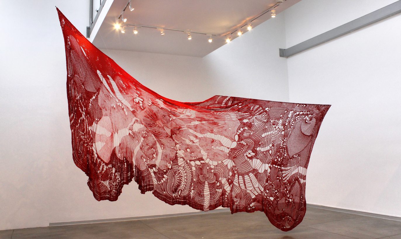 Cristina Flores Pescorán, Catarsis [Catharsis], 2014-16. 
Textile work made with red threads of different sizes crocheted, 500 x 300 x 5cm. Photo: Courtesy of the artist. 