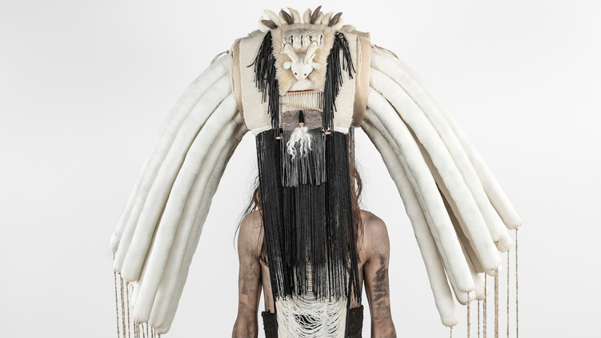 Regalia for Hólo ́–it xistz and ...Son, yáázh, mijo...
2019.
Mixed media and fibre regalia.
Regalia worn in performances at ICA Miami, Miami, FL, and Sanitary Tortilla Factory,
Albuquerque, NM.
Photo by Silvia Ros.
Photo courtesy of ICA Miami.