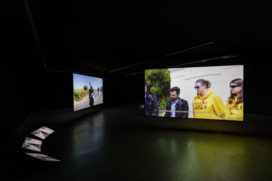 Köken Ergun, HEROES, DEAD, TOURISM, 2024. Presentation at the 24th Biennale of Sydney was made possible with generous assistance from Institut für Auslandsbeziehungen and SAHA Association. Originally commissioned by the Australian War Memorial, Protocinema and Artspace, 2018. Courtesy the artist © Köken Ergun. Installation view, 24th Biennale of Sydney, 2024, UNSW Galleries. Photography: Jacquie Manning.