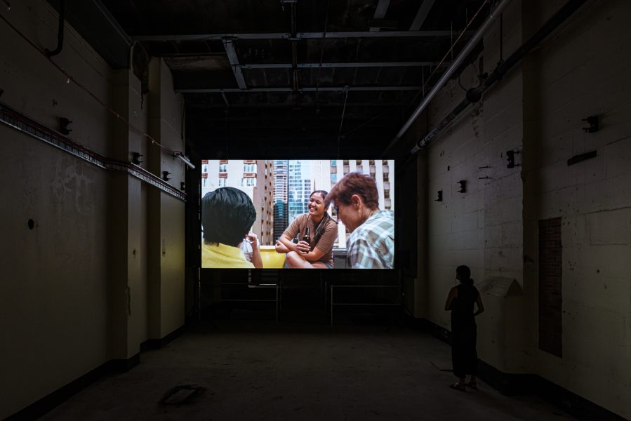 Josh Kline, Adaptation, 2019-2022. Collection of the artist; courtesy 47 Canal, New York. Shown at the Biennale of Sydney as a video projection with permission of the artist. © Josh Kline. Installation view, 24th Biennale of Sydney, Ten Thousand Suns, 2024, White Bay Power Station. Photograph: Document Photography.