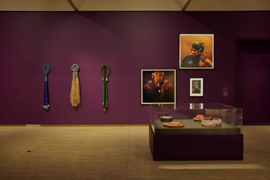 Foreground (left to right): Francisco Toledo, Sin título (Untitled), 2015; Sin título (Untitled), 2015; Sin título (Untitled), 2015; Sin título (Untitled), 2015. Presentation at the 24th Biennale of Sydney was made possible with generous support from a grant from Open Society Foundations. Courtesy Francisco Toledo AC © Estate of Francisco Toledo. Background (left to right): Nádia Taquary, Dinka Yemanjá, 2017. Courtesy of Paulo Darzé Galeria; Dinka Obaluaê, 2018. Courtesy private collection, Abomei; Dinka Ossain, 2018. Courtesy of Paulo Darzé Galeria © Nádia Taquary. Rotimi Fani Kayode, Untitled, 1987-88; Untitled, 1987-88; Sonponnoi, 1987. Courtesy the artist and Autograph, London © Rotimi Fani Kayode. Installation view, 24th Biennale of Sydney, Ten Thousand Suns, 2024, Art Gallery of New South Wales. Photograph: Christopher Snee.