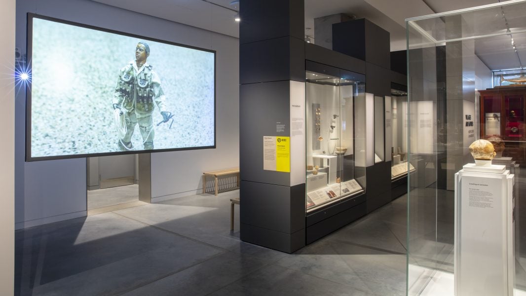 Michael Rakowitz, The Ballad of Special Ops Cody, 2017. Director of photographya nd editor: Robert Chase Heishman. Commissioned by the Museum of Contemporary Art, Chicago. Presentation at the 25th Biennale of Sydney was made possible by  Rubaiya Qatar, Qatar Museums Authority with generous assistance from The Keir Foundation. Courtesy of the artist and Green Art Gallery, Dubai © Michael Rakowitz. Installation view, 25th Biennale of Sydney, Rememory, 2026, Chau Chak Wing Museum, The University of Sydney. Photograph: David James.  