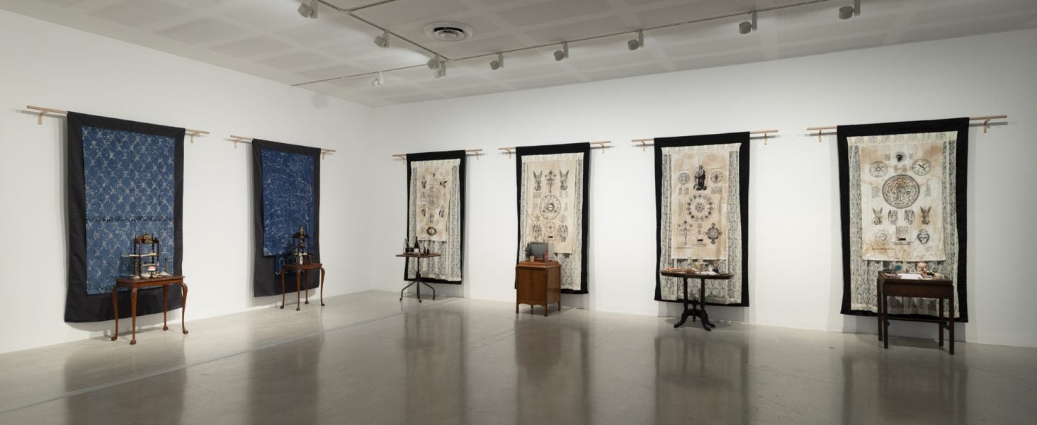 Left to right: Norberto Roldan, Holy Buddha (from the Charleston Shrines Series), Holy Anito (from the Charleston Shrines Series), 2025-2026. Courtesy of the artist and the Foundation for Spirituality and the Arts, Charleston, South Carolina, USA © Norberto Roldan. Norberto Roldan, Holy Son (from the Sydney Shrines Series), Holy Father (from the Sydney Shrines Series), Holy Mother (from the Sydney Shrines Series), Holy Family (from the Sydney Shrines Series), 2026. Commissioned by the Biennale of Sydney with generous support from Mercedes U. Zobel, Artspace Sydney and Campbelltown Arts Centre. Courtesy of the artist and the families who donated the objects © Norberto Roldan. Installation view, 25th Biennale of Sydney, Rememory, 2026, Campbellotwn Arts Centre. Photograph: Silversalt Photography. 