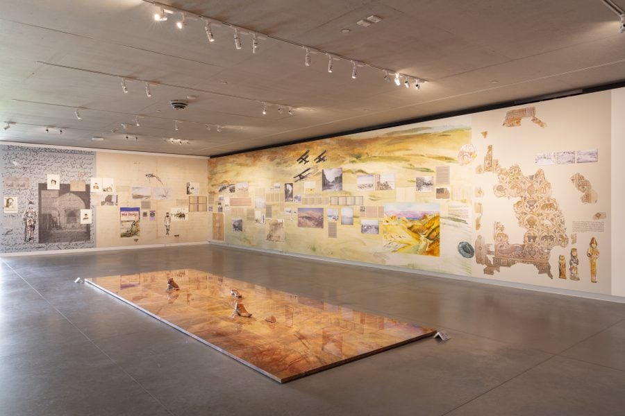 Left to right: Lamia Joreige, Uncertain Times - War diaries, 2026. Commissioned by the Biennale of Sydney and Rubaiya Qatar, Qatar Museums. Research & Design Assistant: Mayssa El Kho. Courtesy of the artist © Lamia Joreige and archival documents, sources, and copyrights courtesy of American University of Beirut/Library Archives; Auckland War Memorial Museum; Australian War Memorial; Başkanlık Osmanlı Arşivi, Istanbul; Imperial War Museum, U.K.; Institute of Palestinian Studies; Library of Congress; State Library of New South Wales; Victorian Collections/Melbourne Legacy; Wikimedia Commons. Dorothy Cross, Red Road, 2021. Presentation at the 25th Biennale of Sydney was made possible with generous support from Culture Ireland. Courtesy of the artist © Dorothy Cross, Kerlin Gallery, Dublin and Frith Street Gallery, London. Installation view, 25th Biennale of Sydney, Rememory, 2026, Chau Chak Wing Museum. Photograph: David James. 